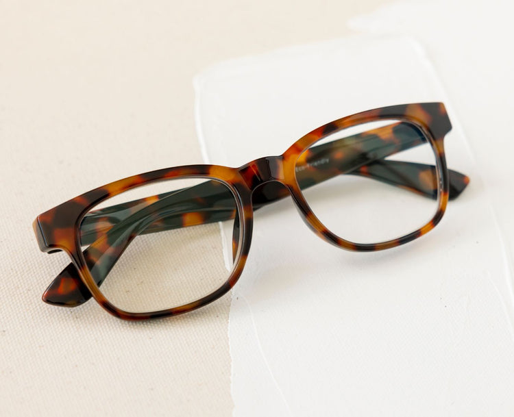 Frame and extras lifestyle image representing the selected color, tortoise
